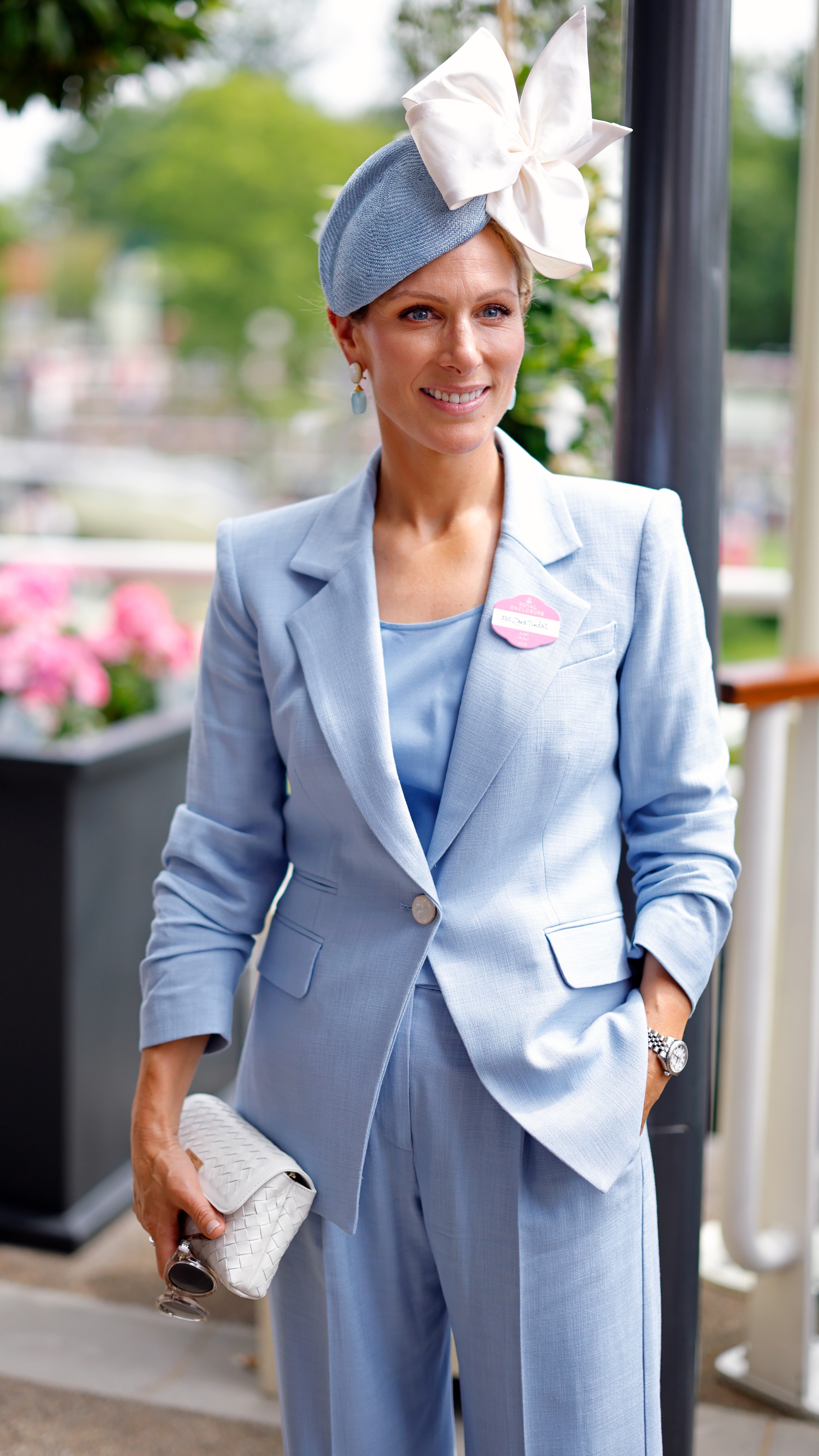 Zara Tindall smiles and poses for a photograph as she attends day four of Royal Ascot at Ascot Racecourse on June 20, 2025