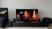 The Sony Bravia 9 II TV and Bravia Theatre Trio speaker system, photographed on a low AV stand