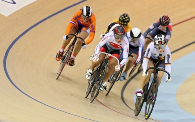 Kristina Vogel (Ger) takes charge on the front to win her Keirin heat.