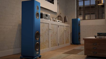 Two Magico A3 2027 speakers either side of a cabinet.