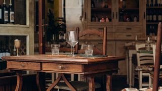 Traditional Tuscan style dining room with a wooden table