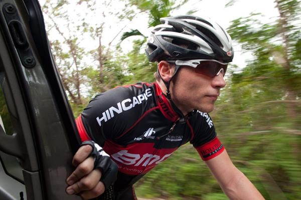Alder Martz has a word with the team director during a training ride