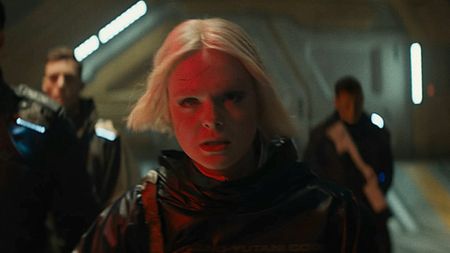 Elle Fanning as Tessa in Predator: Badlands