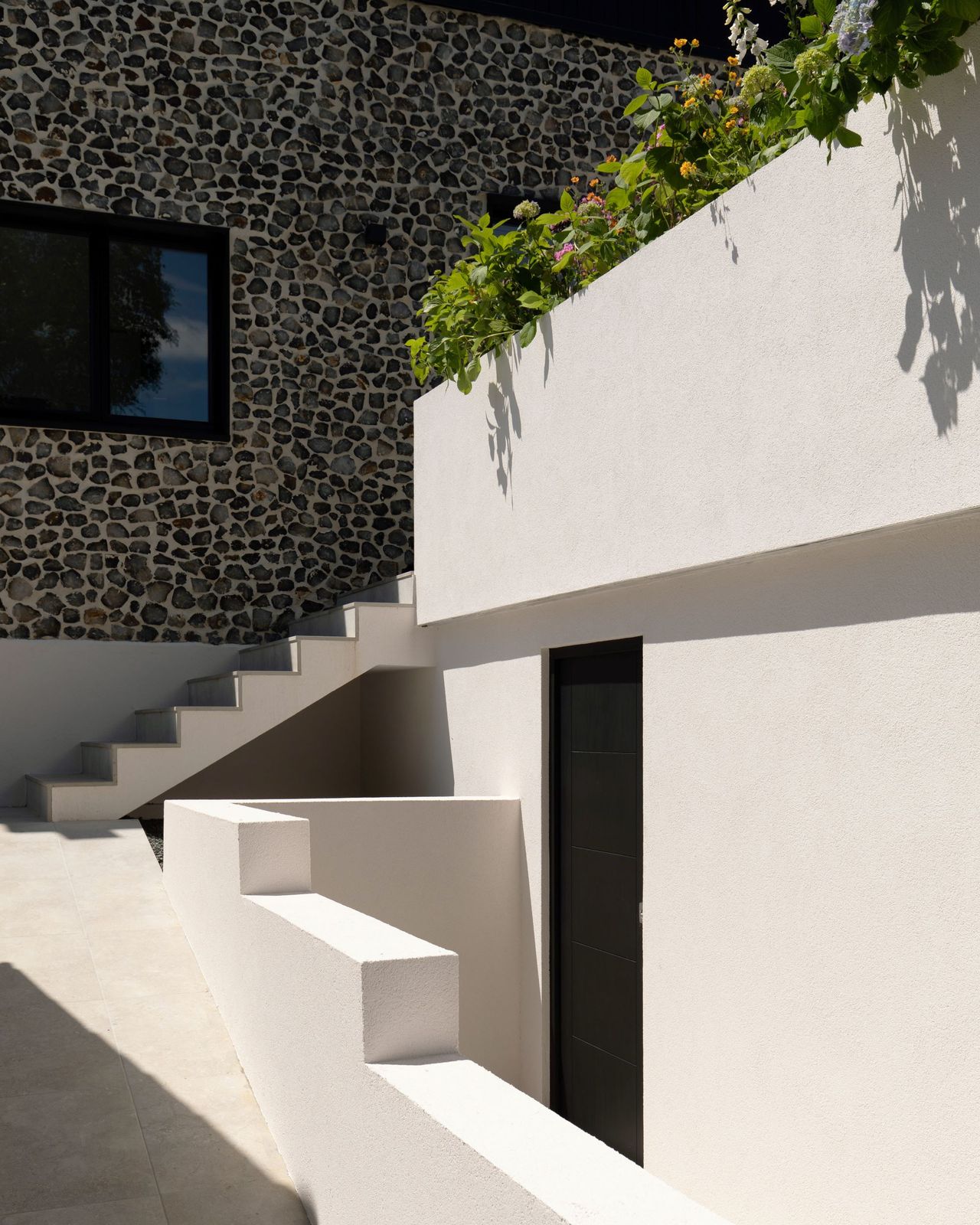 Steps outdoors leading down to the garden in the home