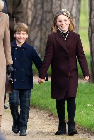 Prince Louis and Mia Tindall holding hands