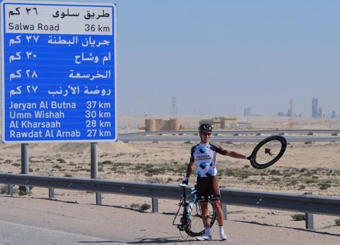 Lloyd Mondory (Ag2r-La Mondiale) waits for a new rear-wheel