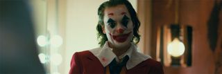 Joaquin Phoenix looking intense as Joker.