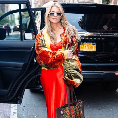 Jessica Simpson wearing oversized sunglasses and a matching set