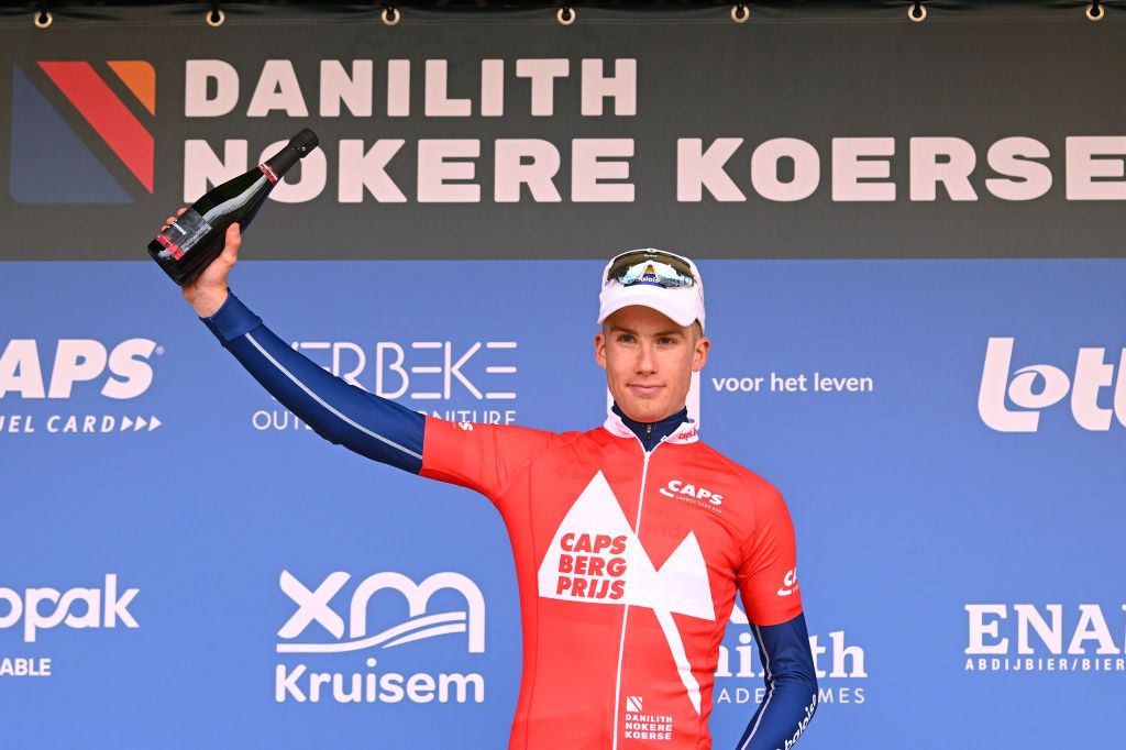NOKERE BELGIUM MARCH 15 Alex Colman of Belgium and Team Flanders Baloise celebrates at podium during the 77th Danilith Nokere Koerse 2023 Mens Elite a 1936km one day race from Deinze to Nokere DanilithNokereKoerse on March 15 2023 in Deinze Belgium Photo by Luc ClaessenGetty Images