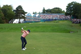 Rory McIlroy hits his second shot into the 18th at the 2022 BMW PGA Championship