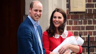 Prince William, Duke of Cambridge and Catherine, Duchess of Cambridge, pose for photographers with their newborn baby boy Prince Louis of Cambridge outside the Lindo Wing of St Mary's Hospital on April 23, 2018 in London, England.
