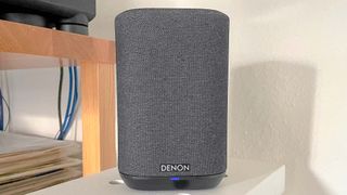 Denon Home 150 on a speaker stand