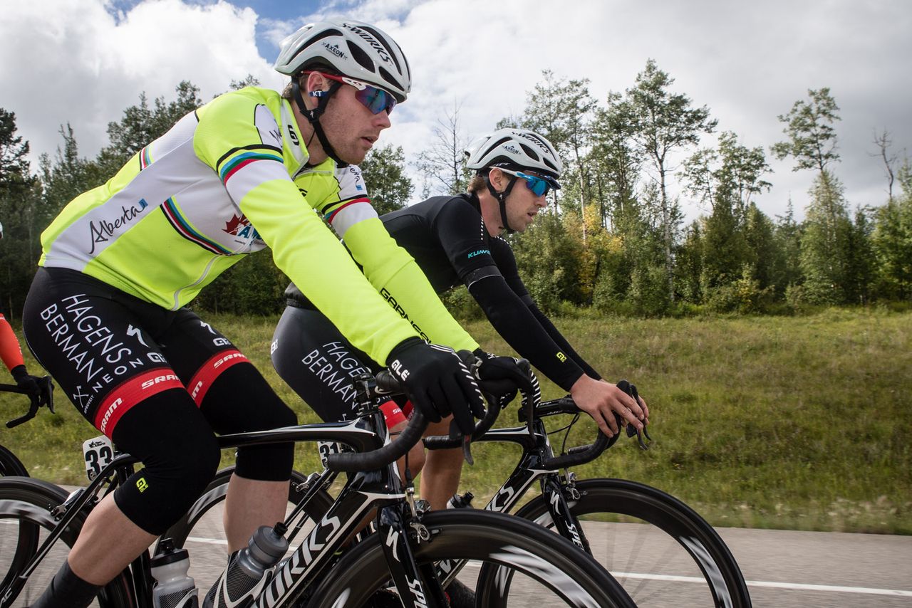 Colin Joyce (Axeon) rides near the front in yellow at the Tour of Alberta