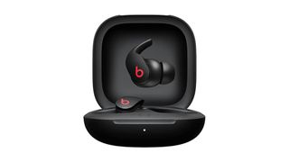 Beats Fit Pro in black charging case on a white background