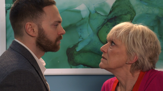 Jean Slater gives Dean Wicks a sinister look.