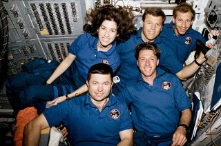 Ellen Ochoa, top left, and Michael Foale, bottom right, are seen on the space shuttle Discovery as STS-56 crewmates in 1993.
