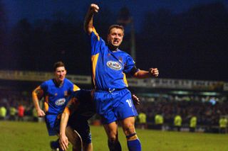 Nigel Jemson celebrates after scoring Shrewsbury Town's winning goal against Everton in the FA Cup, 2003