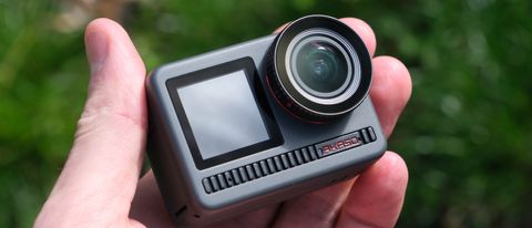 Akaso Brave 8 action camera held in a hand