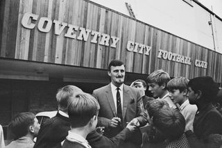Coventry City FC manager Jimmy Hill (1928 - 2015) signing autographs for young fans, Coventry, UK, 18th August 1967.