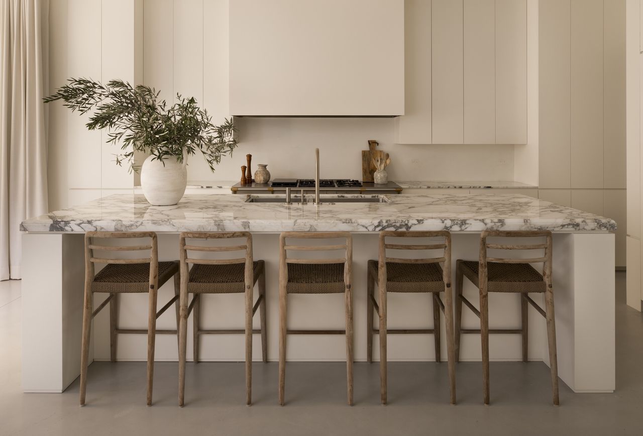 A kitchen island with added seating