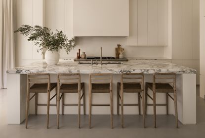 A kitchen island with added seating