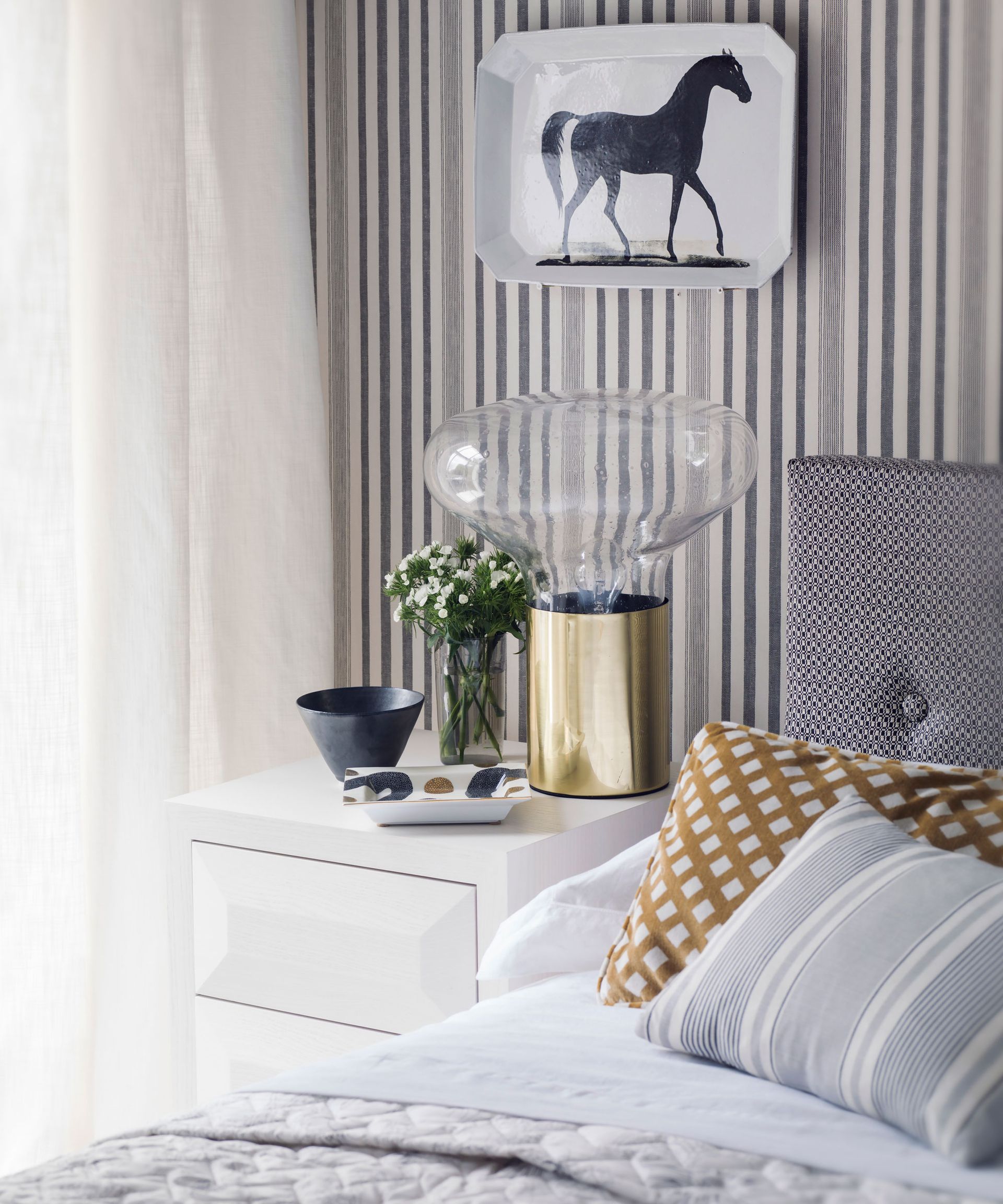 bedroom with double bed and nightstand with lamp