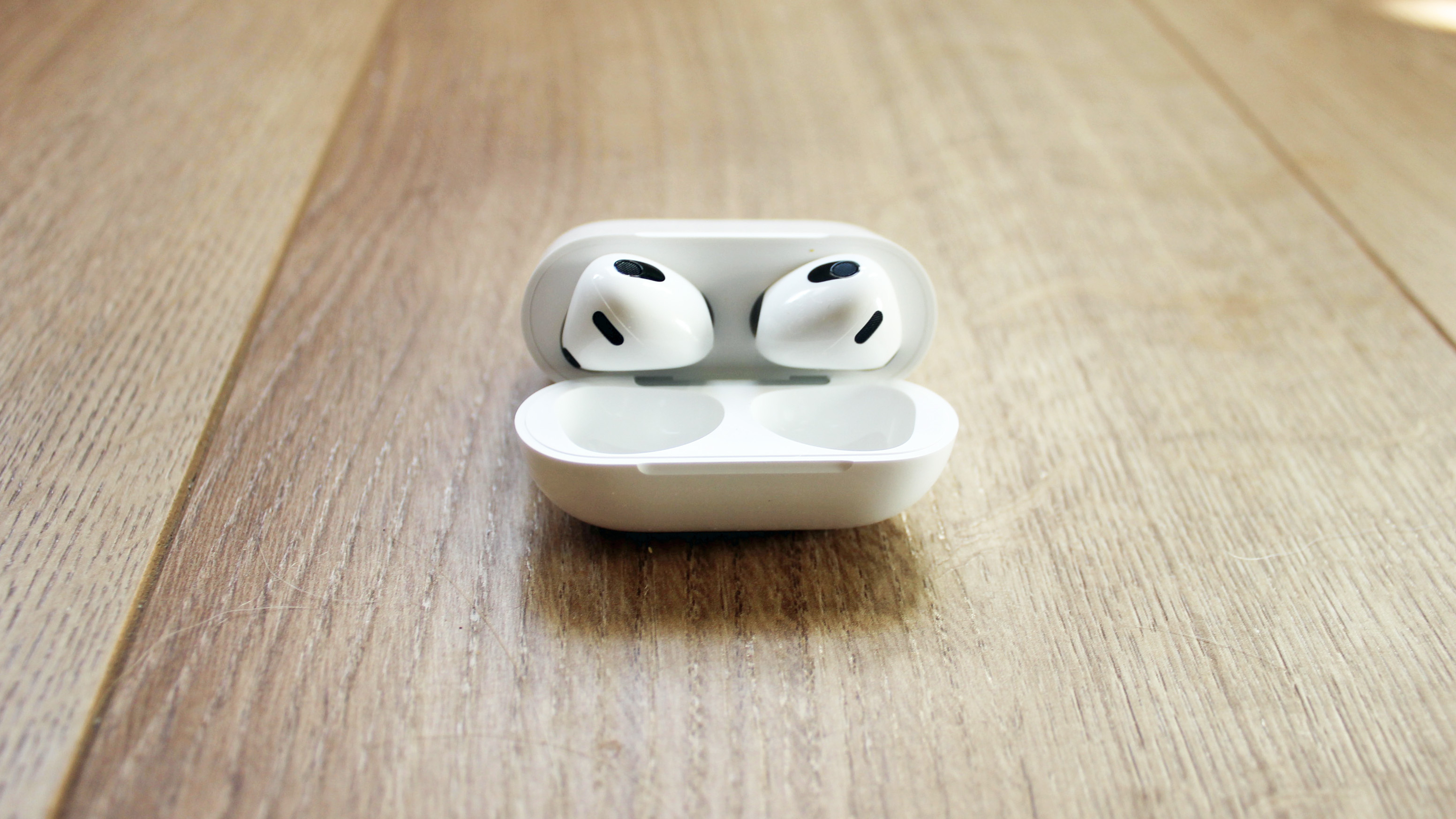 the airpods 3 in their charging case