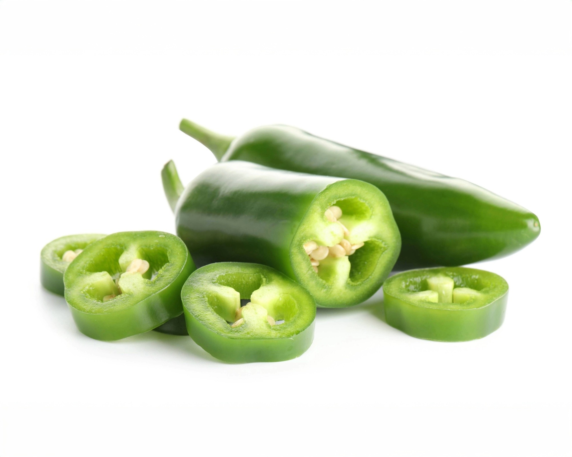 Isolated jalapeno peppers and slices