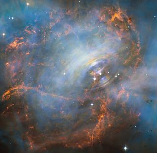 NASA's Hubble Space Telescope captured a stunning image of the central neutron star of the Crab Nebula, which spins at a rate of 30 times per second with a visible pulsating appearance, much like a heart.