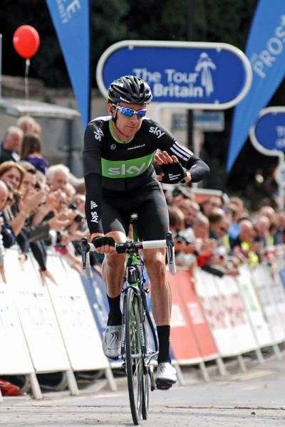 Brad Wiggins (Sky) waves to fans after finishing second.