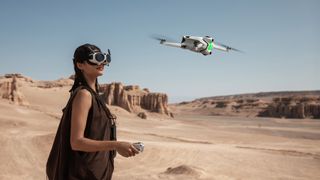 Antigravity A1 drone being flown by woman in the desert