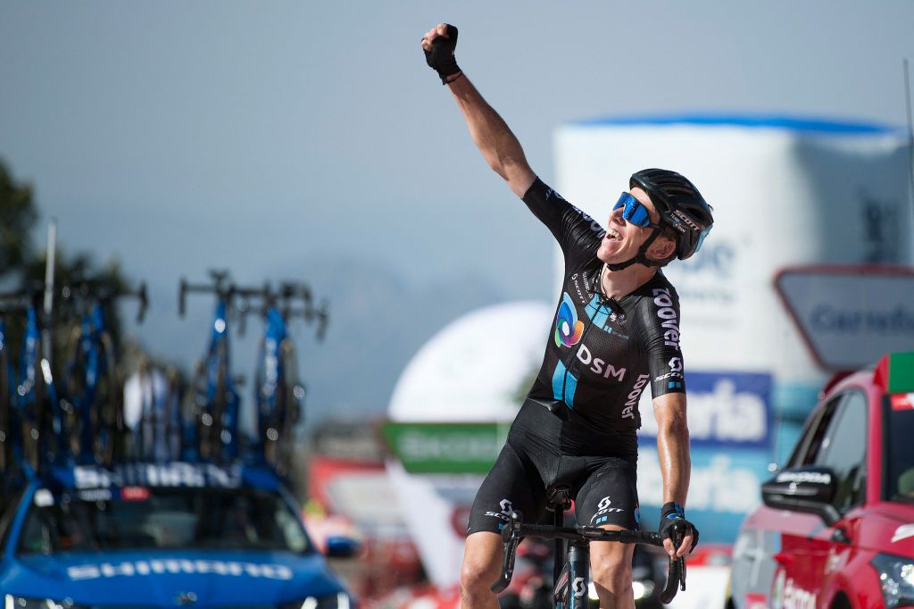 Team Sunwebs French rider Romain Bardet celebrates as he wins the 14th stage of the 2021 La Vuelta cycling tour of Spain a 1657 km race from Don Benito to Pico Villuercas close to Navezuelas on August 28 2021 Photo by JORGE GUERRERO AFP Photo by JORGE GUERREROAFP via Getty Images