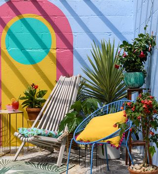 How to paint an exterior wall with yellow and pink wall mural