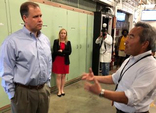 NASA Administrator Jim Bridenstine (left) gets a tour of the Arc Jet Complex at NASA's Ames Research Center in California on Aug. 30, 2018.
