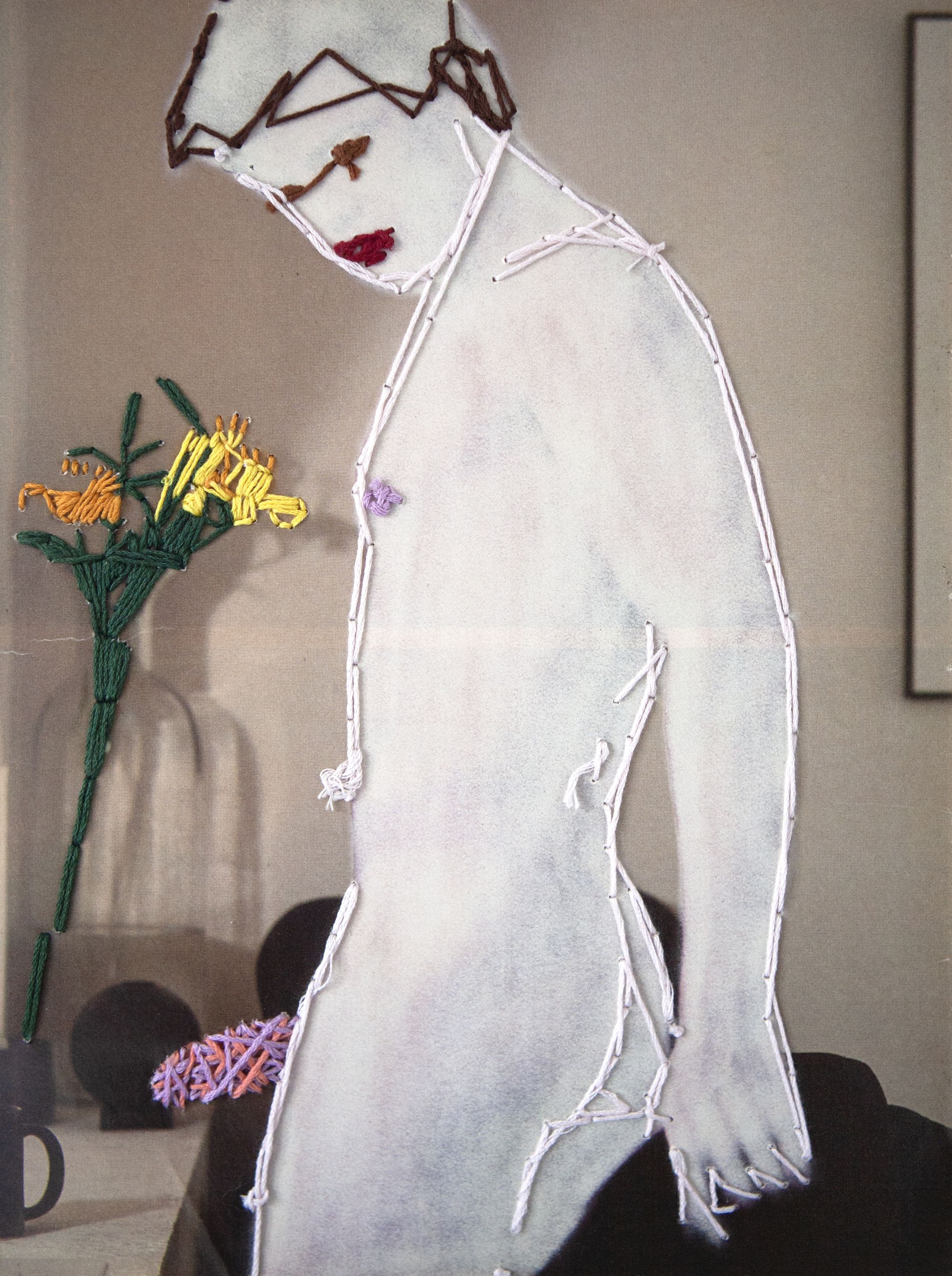 artwork on a man painted over and with threads