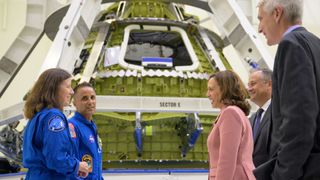 Vice President Kamala Harris meets with NASA astronauts Shannon Walker and Joe Acaba while viewing the Artemis 3 Orion capsule under construction at the Kennedy Space Center on Aug. 29, 2022. 