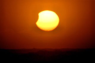 Observer Terre Maize-Nicholson and her husband saw the partial solar eclipse from Otaki Beach in New Zealand.