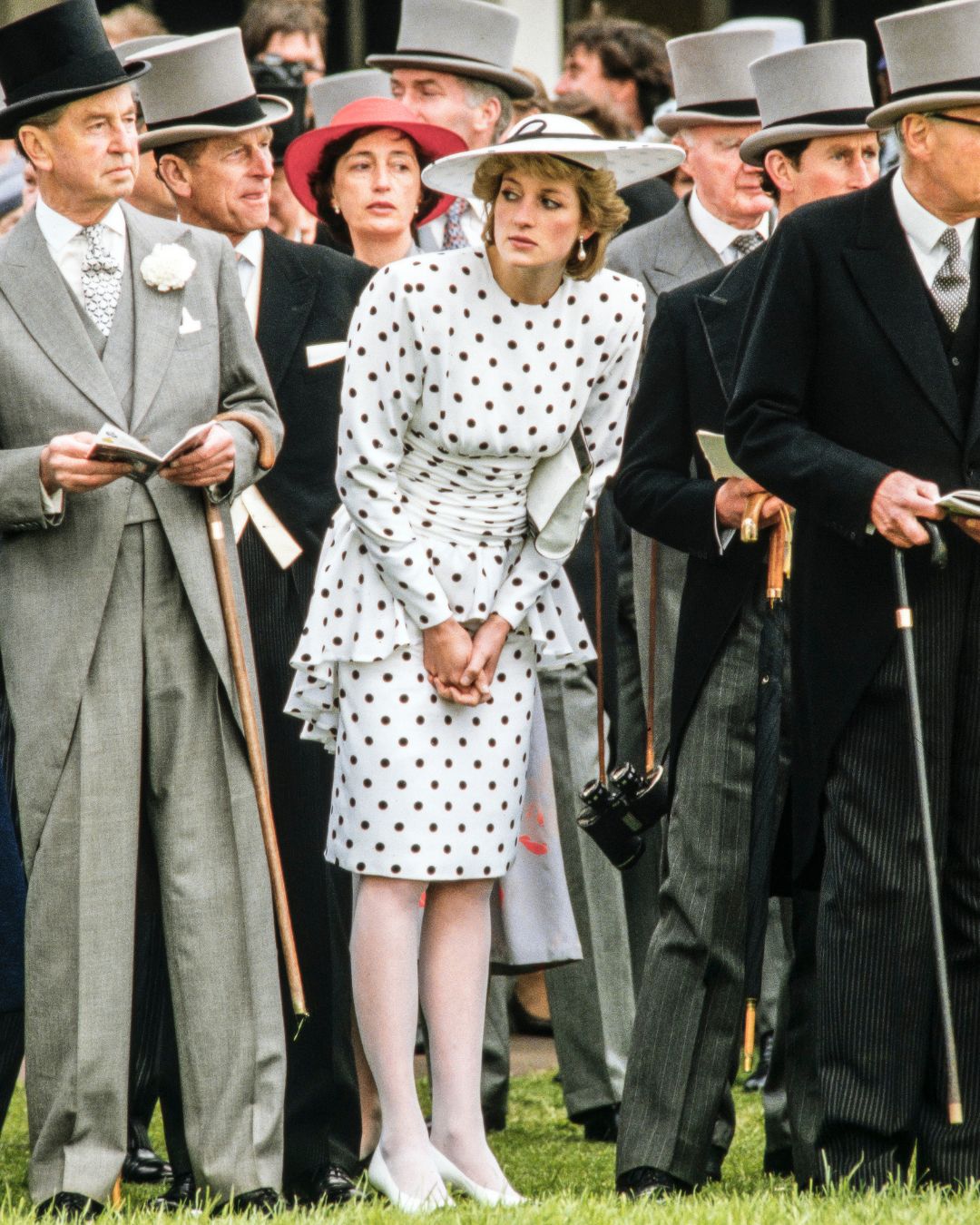 Kate Middleton and Princess Diana wear white polka dot dresses.
