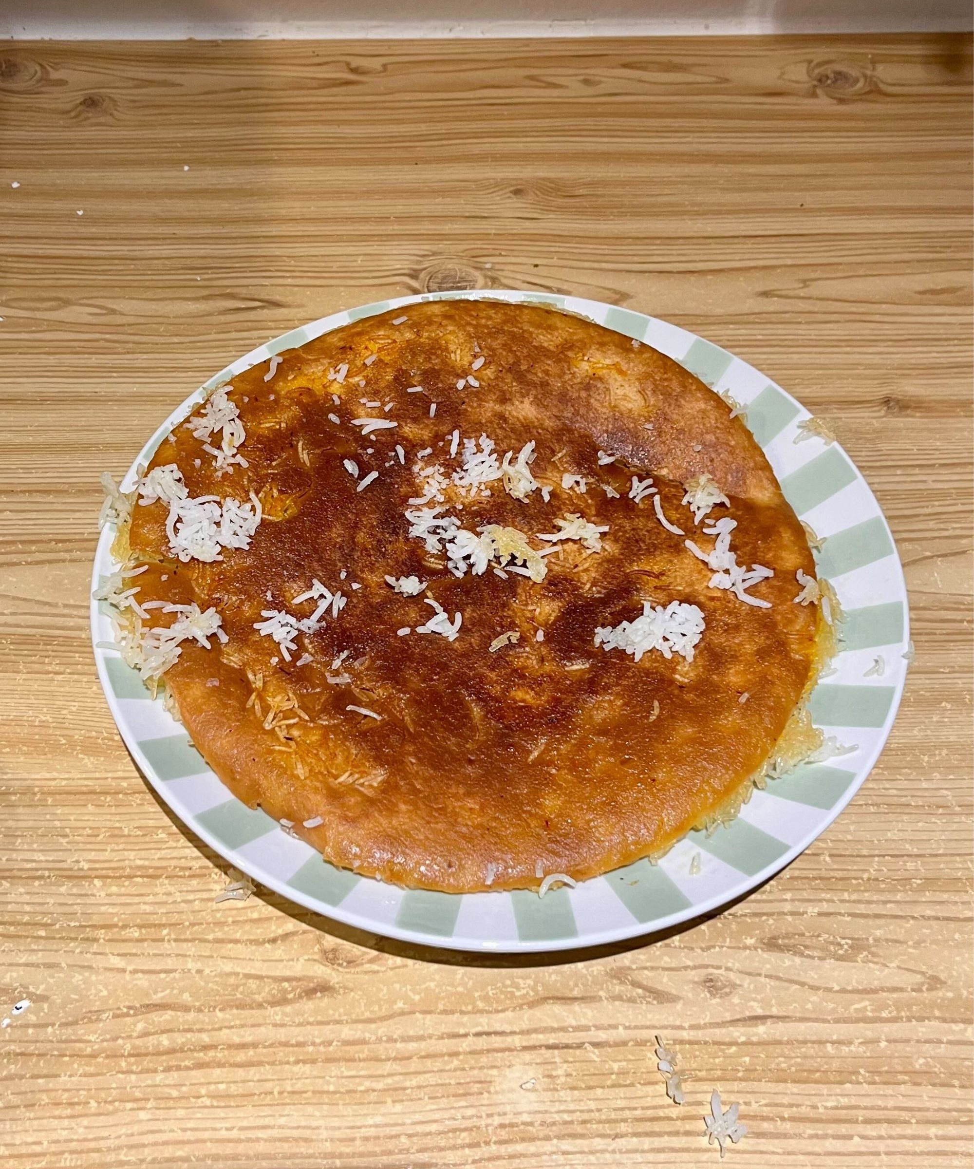 I cooked Persian tahdig with an even crisp in the Our Place Stock Pot. The color of the round crispy 'bottom of the pot' is golden brown, as is desired