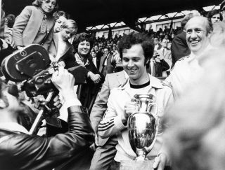 Franz Beckenbauer with the European Championship trophy after West Germany's win at Euro 1972.