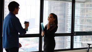 Two people meeting in an office