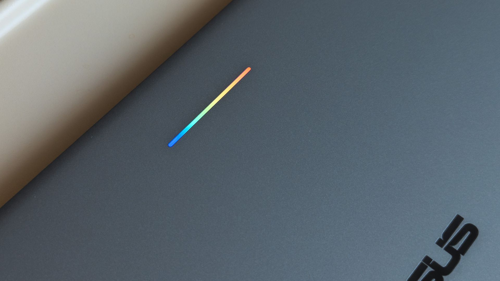 ASUS Googlebook 14 glowbar with rainbow lighting seen on lid