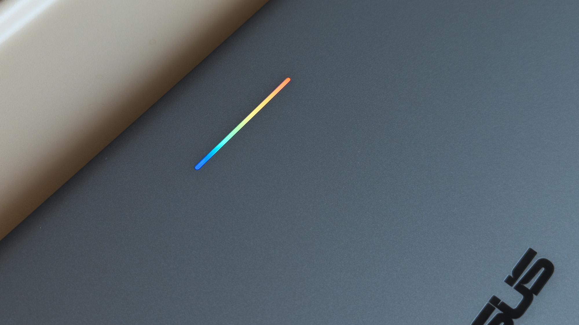ASUS Googlebook 14 glowbar with rainbow lighting seen on lid
