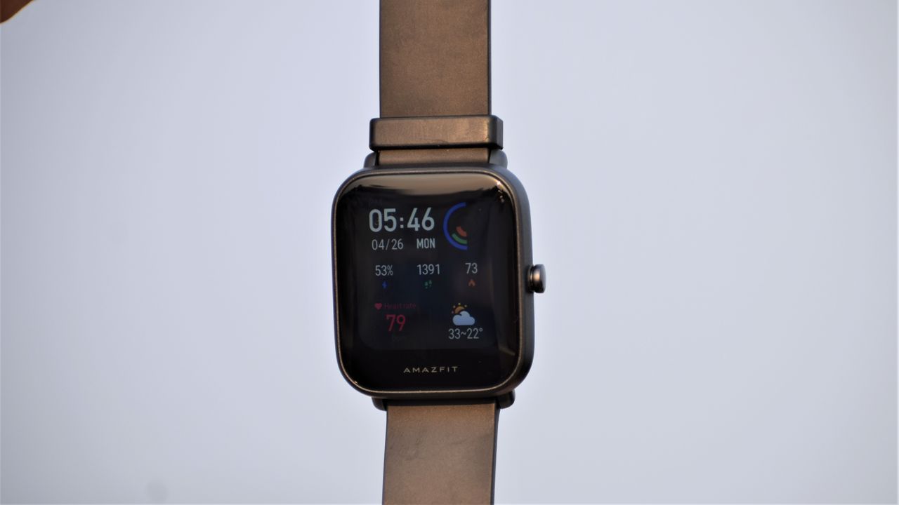 An Amazfit Bip U Pro with the screen on