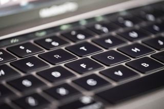 A close-up shot of a MacBook keyboard