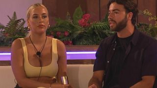 Jess and Sammy sat by the firepit in Love Island UK