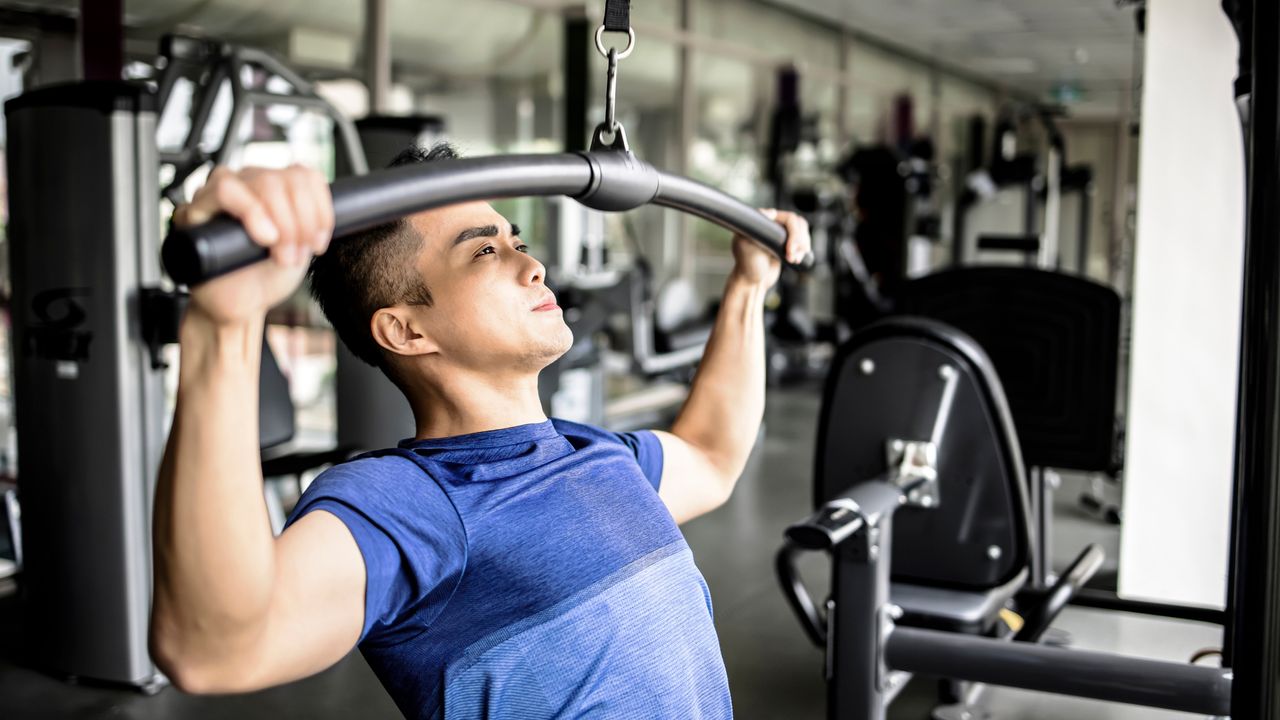 Man doing lat pulldown