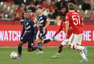Nani (left) in action for Melbourne City against former club Manchester United in a friendly in July 2022.