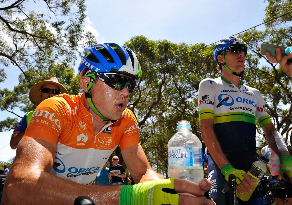 Simon Gerrans and Orica-Greenedge teammate Daryl Impey rest after completing stage five of the Tour Down Under