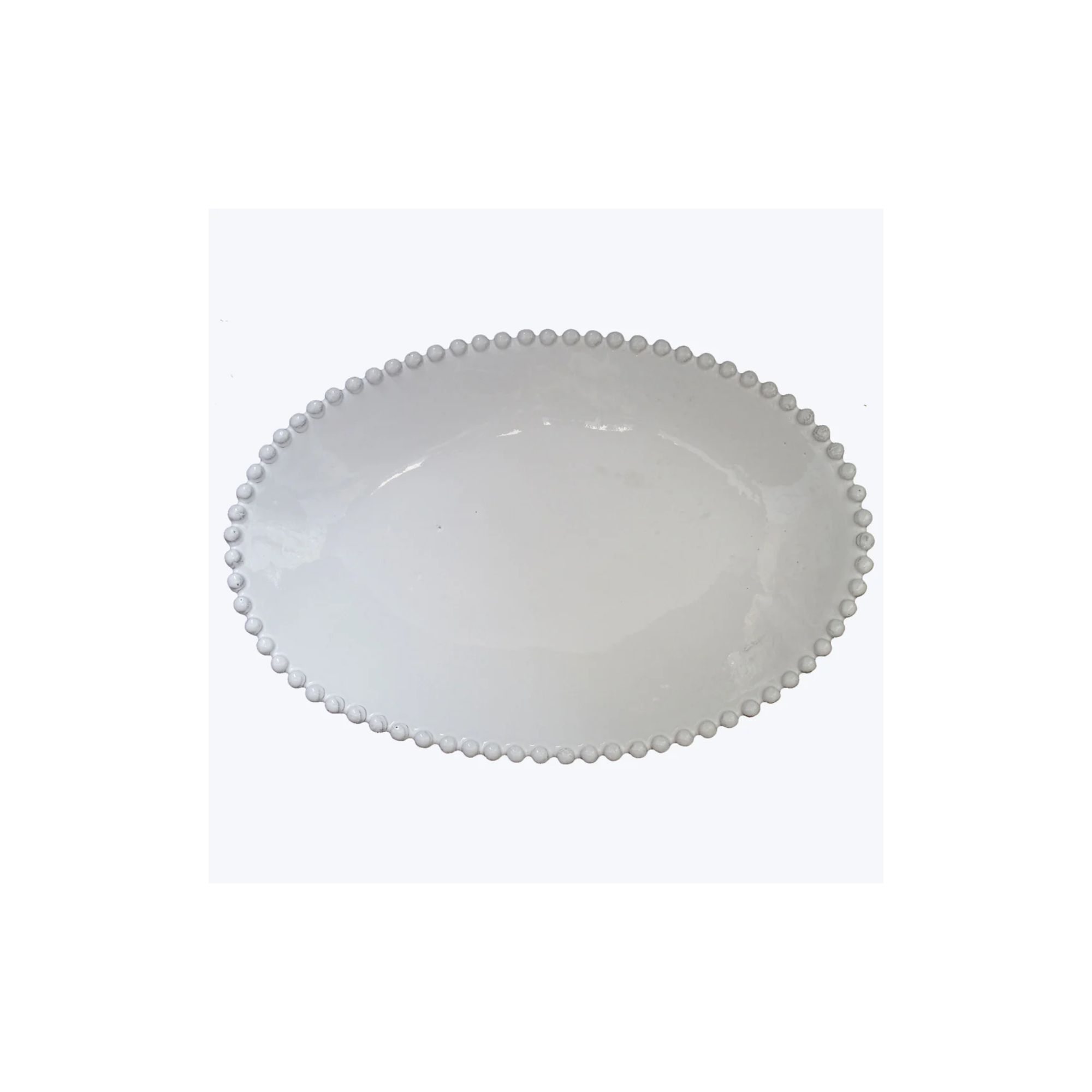 White ceramic bowl with bobbles